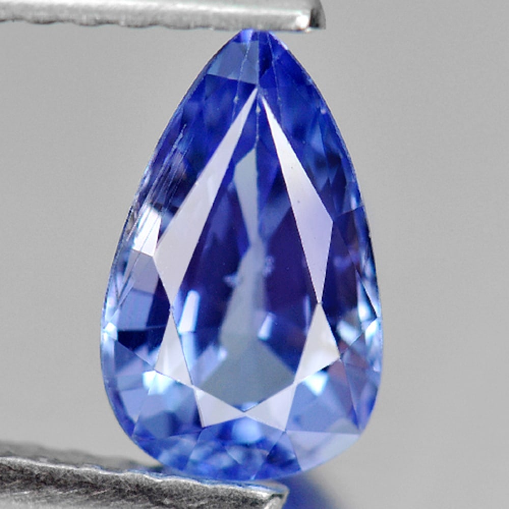 Natural Blue Tanzanite Gemstones 1.12 Ct. Pear Shape 8.5 x 5.2 Mm.: Product ID: 807009248 Product Name: Natural Tanzanite Weight: 1.12 CT. Size: 8.5 x 5.2 x 3.9 MM. Shape: Pear Color: Violetish Blue Clarity:VSI Luster: Good Gems Origin: Tanzania Treatment: Heated Crys