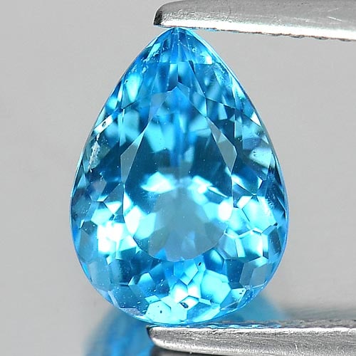 Natural Swiss Blue Topaz Gemstones 2.93 Ct. Pear Shape 10.5 x 7.7 Mm.: Product ID: 807155082 Product Name: Natural Blue Topaz Weight: 2.93 CT. Size: 10.5 x 7.7 x 5.4 MM. Shape: Pear Color: Swiss Blue Clarity:VSI Luster: Good Gems Origin: Brazil Treatment: Treated Crystal