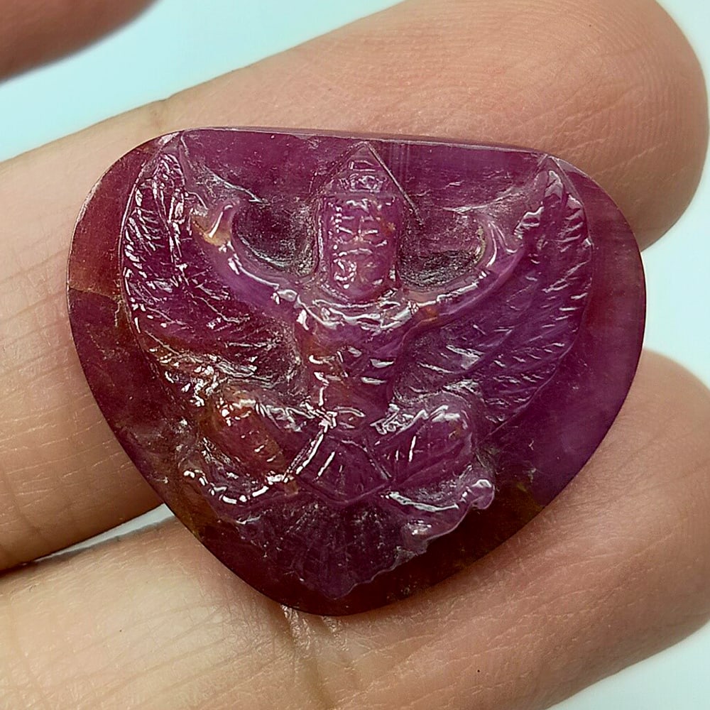 Natural Guarantee Pink Red Ruby Gemstones 35.18 Ct. Happy Garuda Carving Cut 23 x 20 Mm. Set For: Product ID: 501200050 Product Name: Natural Gemstones Weight: 35.18 CT. Size: 20 x 23 x 7 MM. Shape: Carving shape Color: Pink Red Clarity:None Luster: Good Carving Gems Origin: Madagascar Treatment: 