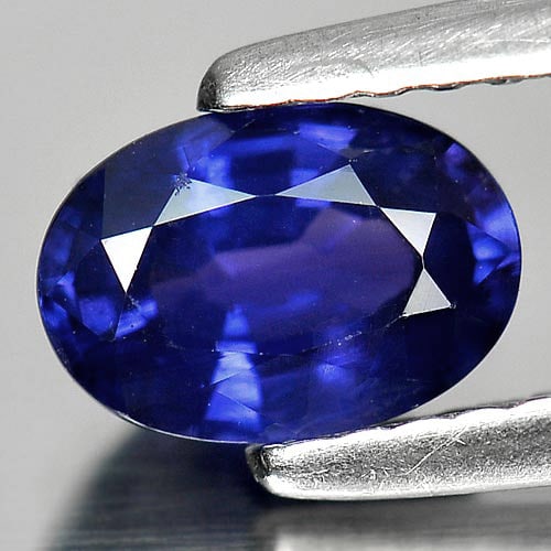 Natural Purplish Blue Sapphire Gemstones 1.03 Ct. Oval Shape 7.1 x 5 Mm.: Product ID: 806006324 Product Name: Natural Blue Sapphire Weight: 1.03 CT. Size: 7.1 x 5 x 3.6 MM. Shape: Oval Color: Blue Clarity:VSI Luster: Good Gems Origin: Madagascar Treatment: Heated Crystal St