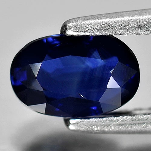 Natural Blue Sapphire Gemstone 1.20 Ct. Oval Shape 4.77 x 7.28 Mm.: Product ID: 806010298 Product Name: Natural Blue Sapphire Weight: 1.20 CT. Size: 4.77 x 7.28 x 3.18 MM. Shape: Oval Color: Blue Clarity:VSI Luster: Good Gems Origin: Thailand Treatment: Unheated Cryst
