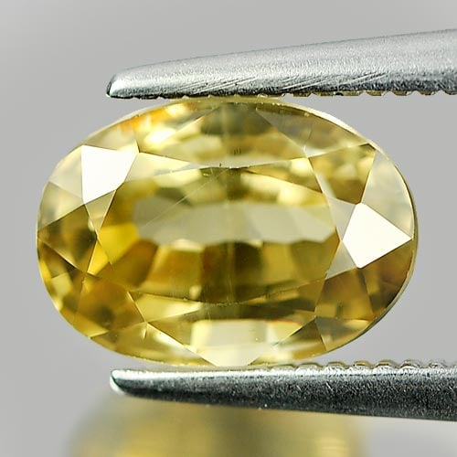 Natural Yellow Zircon Gemstones 3.55 Ct. Oval Shape 9.1 x 6.5 Mm.: Product ID: 807729436 Product Name: Natural Zircon Weight: 3.55 CT. Size: 9.1 x 6.5 x 5.2 MM. Shape: Oval Color: Yellow Clarity:VSI Luster: Very Good Gems Origin: Cambodia Treatment: Heated Crystal St