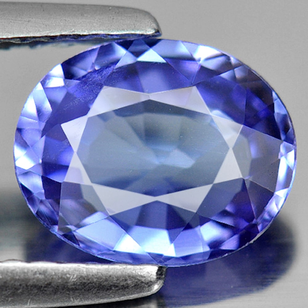 Natural Blue Tanzanite Gemstones 1.32 Ct. Clean Oval Shape 7.9 x 6.4 Mm.: Product ID: 807006291 Product Name: Natural Tanzanite Weight: 1.32 CT. Size: 7.9 x 6.4 x 3.4 MM. Shape: Oval Color: Violetish Blue Clarity:IF Luster: Good Gems Origin: Tanzania Treatment: Heated Cryst