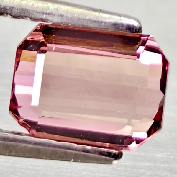 Natural Pink Tourmaline Gemstones 0.91 Ct. Octagon Shape 6.4 x 4.9 Mm.: Product ID: 807250914 Product Name: Natural Tourmaline Weight: 0.91 CT. Size: 6.4 x 4.9 x 3 MM. Shape: Octagon Color: Pink Clarity:VSI Luster: Good Gems Origin: Nigeria Treatment: Unheated Crystal Str
