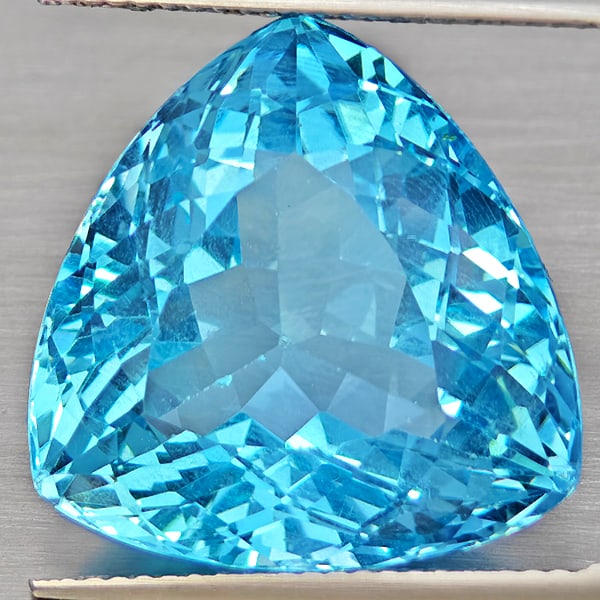 Natural Baby Blue Color Topaz Gemstones 20.60 Ct. Trilliant Shape 18.3 Mm. (1 of 3)