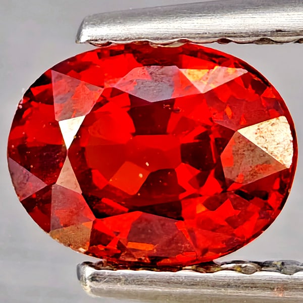 Natural Orangish Red Spessartine Garnet Gemstones 0.88 Ct. Oval Shape 6.2 x 4.8 Mm.: Product ID: 802937331 Product Name: Natural Garnet Weight: 0.88 CT. Size: 6.2 x 4.8 x 3.5 MM. Shape: Oval Shape Color: Orangish Red Clarity:SI1 Luster: Good Gems Origin: Namibia Treatment: Unheated Cr