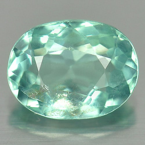 Natural Paraiba Color Apatite Gemstones 1.42 Ct. Oval Shape 8 x 6.2 Mm.: Product ID: 800612699 Product Name: Natural Apatite Weight: 1.42 CT. Size: 8 x 6.2 x 3.8 MM. Shape: Oval Color: Green Clarity:VSI Luster: Good Gems Origin: Tanzania Treatment: Unheated Crystal Structu
