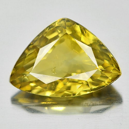 Natural Yellow Chrysoberyl Gemstones 1.15 Ct. Trilliant Shape 8 x 5.7 Mm.: Product ID: 801701111 Product Name: Natural Chrysoberyl Weight: 1.15 CT. Size: 8 x 5.7 x 3.5 MM. Shape: Trilliant Color: Yellow Clarity:VSI Luster: Good Gems Origin: Madagascar Treatment: Unheated Cry