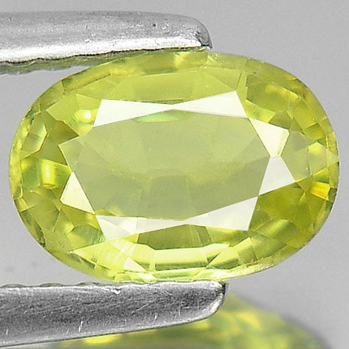 Natural Yellow Chrysoberyl Gemstones 1.00 Ct. Oval Shape 7.4 x 5.2 Mm.: Product ID: 801102735 Product Name: Natural Chrysoberyl Weight: 1.00 CT. Size: 7.4 x 5.2 x 3 MM. Shape: Oval Color: Yellow Clarity:VS Luster: Very Good Gems Origin: Brazil Treatment: Unheated Crystal 
