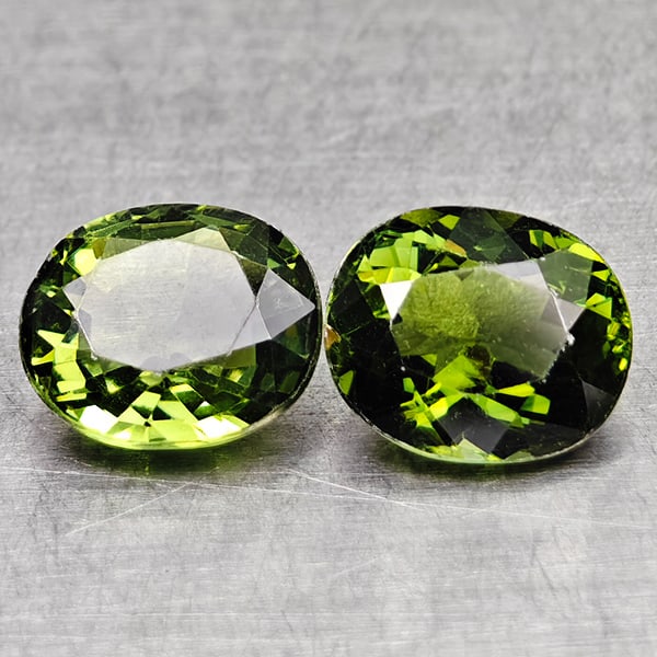 Natural Green Tourmaline 1.57 Ct. 2 Pcs. Oval Shape 6.3 x 5.3 Mm.: Product ID: 807250686 Product Name: Natural Tourmaline Weight: 1.57 CT. Size: 6.3 x 5.3 x 3.6 MM. Shape: Oval Color: Party Color Clarity:VSI Luster: Good Gems Origin: Nigeria Treatment: Unheated Cryst