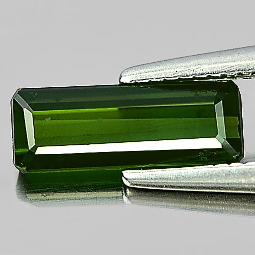 Natural Green Tourmaline Gemstones 0.85 Ct. Octagon Shape 9.4 x 3.5 Mm.: Product ID: 807248685 Product Name: Natural Tourmaline Weight: 0.85 CT. Size: 9.4 x 3.5 x 2.5 MM. Shape: Octagon Color: Green Clarity:VSI Luster: Good Gems Origin: Nigeria Treatment: Unheated Crystal 