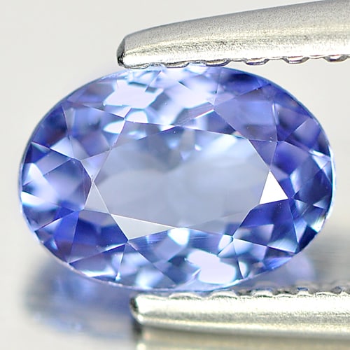 Natural Blue Tanzanite Gemstones 0.72 Ct. Oval Shape 6.7 x 4.9 Mm.: Product ID: 807004529 Product Name: Natural Tanzanite Weight: 0.72 CT. Size: 6.7 x 4.9 x 3.1 MM. Shape: Oval Color: Violet Blue Clarity:VVS Luster: Good Gems Origin: Tanzania Treatment: Heated Crystal