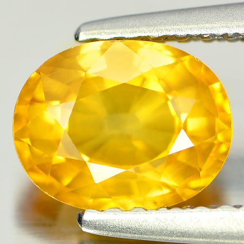 Natural Yellow Sapphire Gemstones 1.62 Ct. Oval Shape 7.6 x 5.9 Mm.: Product ID: 806138074 Product Name: Natural Yellow Sapphire Weight: 1.62 CT. Size: 7.6 x 5.9 x 4 MM. Shape: Oval Color: Yellow Clarity:SI Luster: Good Gems Origin: Bangkaja, Thailand Treatment: Heated