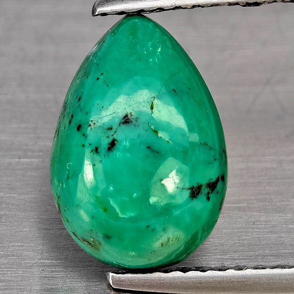 Natural Multi Color Green Turquoise Gemstones 3.18 Ct. Pear Shape Cabochon 12.2 x 8.5 Mm.: Product ID: 809100010 Product Name: Natural Gemstones Weight: 3.18 CT. Size: 12.2 x 8.5 x 4.5 MM. Shape: Pear Cabochon Color: Multi Color Green Clarity:Opaque Luster: Good Gems Origin: India Treatment