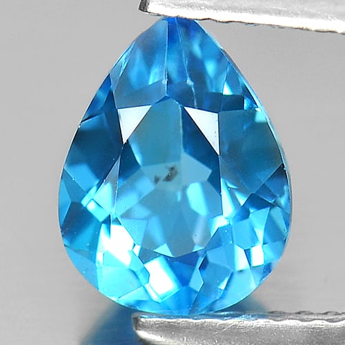 Natural Swiss Blue Topaz Gemstone 2.15 Ct. VVS Pear Shape 9.2 x 7 Mm.: Product ID: 807151034 Product Name: Natural Blue Topaz Weight: 2.15 CT. Size: 9.2 x 7 x 4.8 MM. Shape: Pear Color: Swiss Blue Clarity:VVS Luster: Good Gems Origin: Brazil Treatment: Treated Crystal St