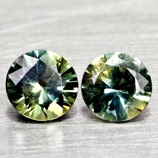Natural Fancy Color Sapphire Gemstones 0.42 Ct. 2 Pcs. Round Diamand Cut 3.6 Mm.: Product ID: 806162230 Product Name: Natural Green Sapphire Weight: 0.42 CT. Size: 3.6 x 3.6 x 2.4 MM. Shape: Round Diamond Cut Color: Fancy Color Clarity:VSI Luster: Very Good Gems Origin: Tanzania Tr