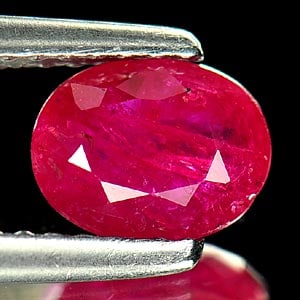 Natural Purplish Pink Ruby Gemstones 0.96 Ct. Oval Shape 6.9 x 5.3 Mm.: Product ID: 805927051 Product Name: Natural Ruby Weight: 0.96 CT. Size: 6.9 x 5.3 x 2.7 MM. Shape: Oval Color: Purplish Pink Clarity:VSI Luster: Good Gems Origin: Tanzania Treatment: Heated (Lead-glas