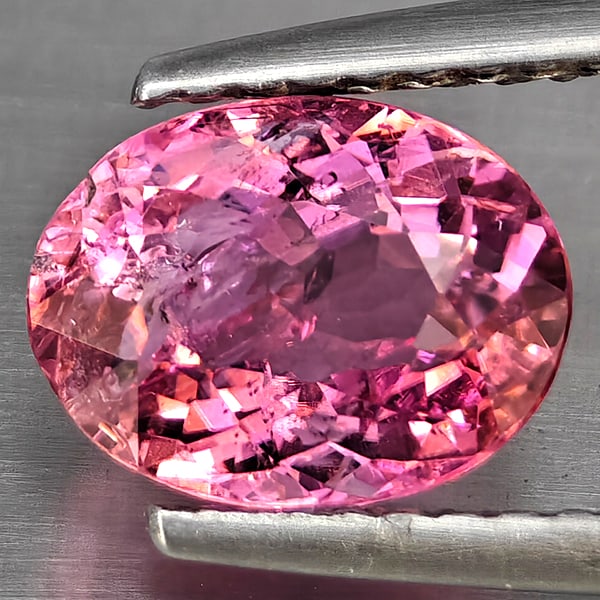 Natural Pink Tourmaline Gemstones 1.48 Ct. Oval Shape 8.3 x 6.4 Mm.: Product ID: 107210013 Product Name: Natural Tourmaline Weight: 1.48 CT. Size: 8.3 X 6.4 X 4.3 MM. Shape: Oval Color: Pink Clarity:SI Luster: Good Gems Origin: Nigeria Treatment: Unheated Crystal Struc