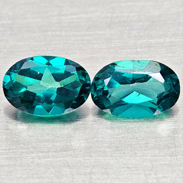 Natural Bluish Green Topaz Gemstones 1.09 Ct. 2 Pcs. Oval Shape 6 x 3.9 Mm.: Product ID: 807168090 Product Name: Natural Topaz Weight: 1.09 CT. Size: 6 x 3.9 x 3.1 MM. Shape: Oval Color: Bluish Green Clarity:VSI Luster: Good Gems Origin: Brazil Treatment: Treated Crystal Struc