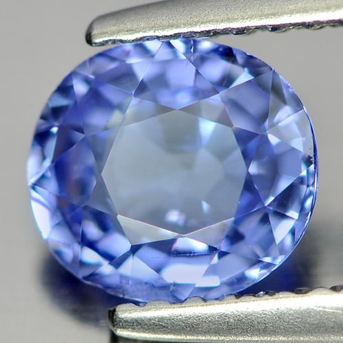 Natural Blue Tanzanite Gemstones 1.11 Ct. Oval Shape 6.89 x 6.24 Mm.: Product ID: 807005331 Product Name: Natural Tanzanite Weight: 1.11 CT. Size: 6.89 x 6.24 x 3.44 MM. Shape: Oval Color: Blue Clarity:VSI Luster: Good Gems Origin: Tanzania Treatment: Heated Crystal Str