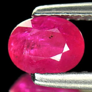 Natural Purplish Pink Ruby Gemstones 0.87 Ct. Oval Shape 6.2 x 4.7 Mm.: Product ID: 805927080 Product Name: Natural Ruby Weight: 0.87 CT. Size: 6.2 x 4.7 x 3.4 MM. Shape: Oval Color: Purplish Pink Clarity:VSI Luster: Good Gems Origin: Tanzania Treatment: Heated (Lead-glas