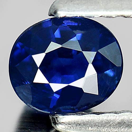 Natural Blue Sapphire Gemstones 0.58 Ct. Oval Shape 5.2 x 4.4 Mm.: Product ID: 806008206 Product Name: Natural Blue Sapphire Weight: 0.58 CT. Size: 5.2 x 4.4 x 2.9 MM. Shape: Oval Color: Blue Clarity:VSI Luster: Good Gems Origin: Thailand Treatment: Heated Crystal St