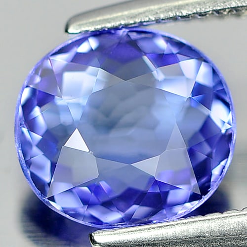 Natural Blue Tanzanite Gemstones 1.30 Ct. Clean Oval Shape 7.3 x 6.7 Mm.: Product ID: 807006028 Product Name: Natural Tanzanite Weight: 1.30 CT. Size: 7.3 x 6.7 x 3.3 MM. Shape: Oval Color: Violetish Blue Clarity:IF Luster: Very Good Gems Origin: Tanzania Treatment: Heated 
