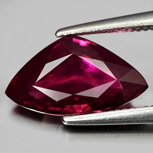 Natural Purplish Red Tourmaline Gemstones 1.93 Ct. Clean Trilliant Shape 7 x 12 Mm.: Product ID: 807239569 Product Name: Natural Tourmaline Weight: 1.93 CT. Size: 7 x 12 x 3.8 MM. Shape: Trilliant Color: Purplish Red Clarity:IF Luster: Good Gems Origin: Nigeria Treatment: Unheated Cry