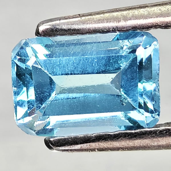 Natural Swiss Blue Topaz Gemstones 0.75 Ct. Octagon Shape 6.1 x 4.2 Mm.: Product ID: 807168190 Product Name: Natural Blue Topaz Weight: 0.75 CT. Size: 6.1 x 4.2 x 3.2 MM. Shape: Octagon Color: Swiss Blue Clarity:VSI Luster: Good Gems Origin: Brazil Treatment: Treated Cryst