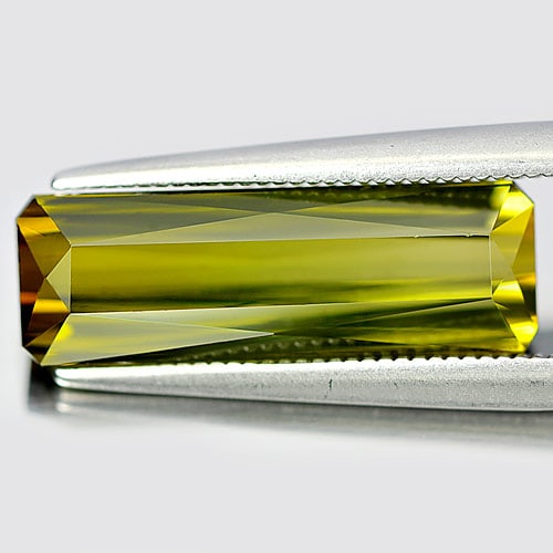 Natural Lime Green Tourmaline Gemstones 6.42 Ct. VVS Octagon Shape 18.5 x 6.2 Mm.: Product ID: 807241055 Product Name: Natural Tourmaline Weight: 6.42 CT. Size: 18.5 x 6.2 x 5.4 MM. Shape: Octagon Color: Lime Green Clarity:VVS Luster: Very Good Gems Origin: Nigeria Treatment: Unheat