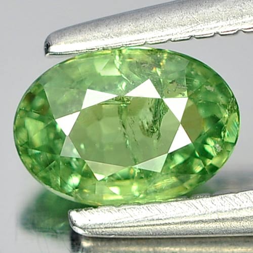 Natural Green Demantoid Garnet Gemstones 0.51 Ct. Oval Shape 5.8 x 4 Mm.: Product ID: 802912893 Product Name: Natural Demantoid Weight: 0.51 CT. Size: 5.8 x 4 x 2.5 MM. Shape: Oval Color: Green Clarity:SI Luster: Good Gems Origin: Madagascar , Africa Treatment: Unheated Cry