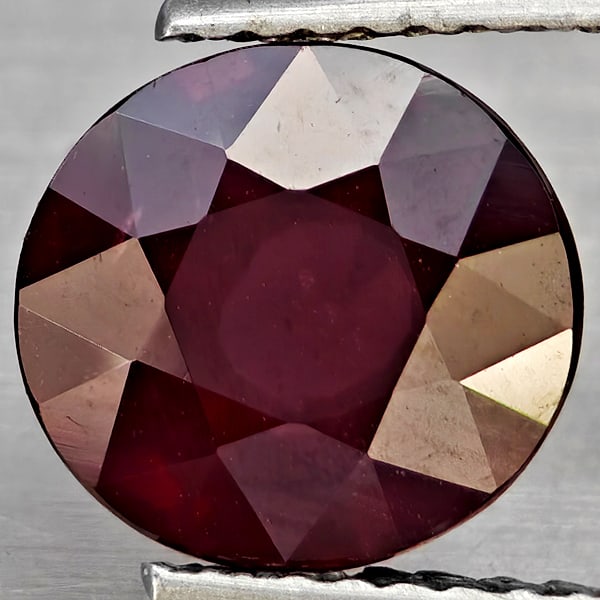 Natural Purplish Red Rhodolite Garnet Gemstones 2.61 Ct. Oval Shape 8.5 x 8 Mm.: Product ID: 802937786 Product Name: Natural Rhodolite Weight: 2.61 CT. Size: 8.5 x 8 x 4.9 MM. Shape: Oval Shape Color: Purplish Red Clarity:VSI Luster: Good Gems Origin: Madagascar Treatment: Unheate