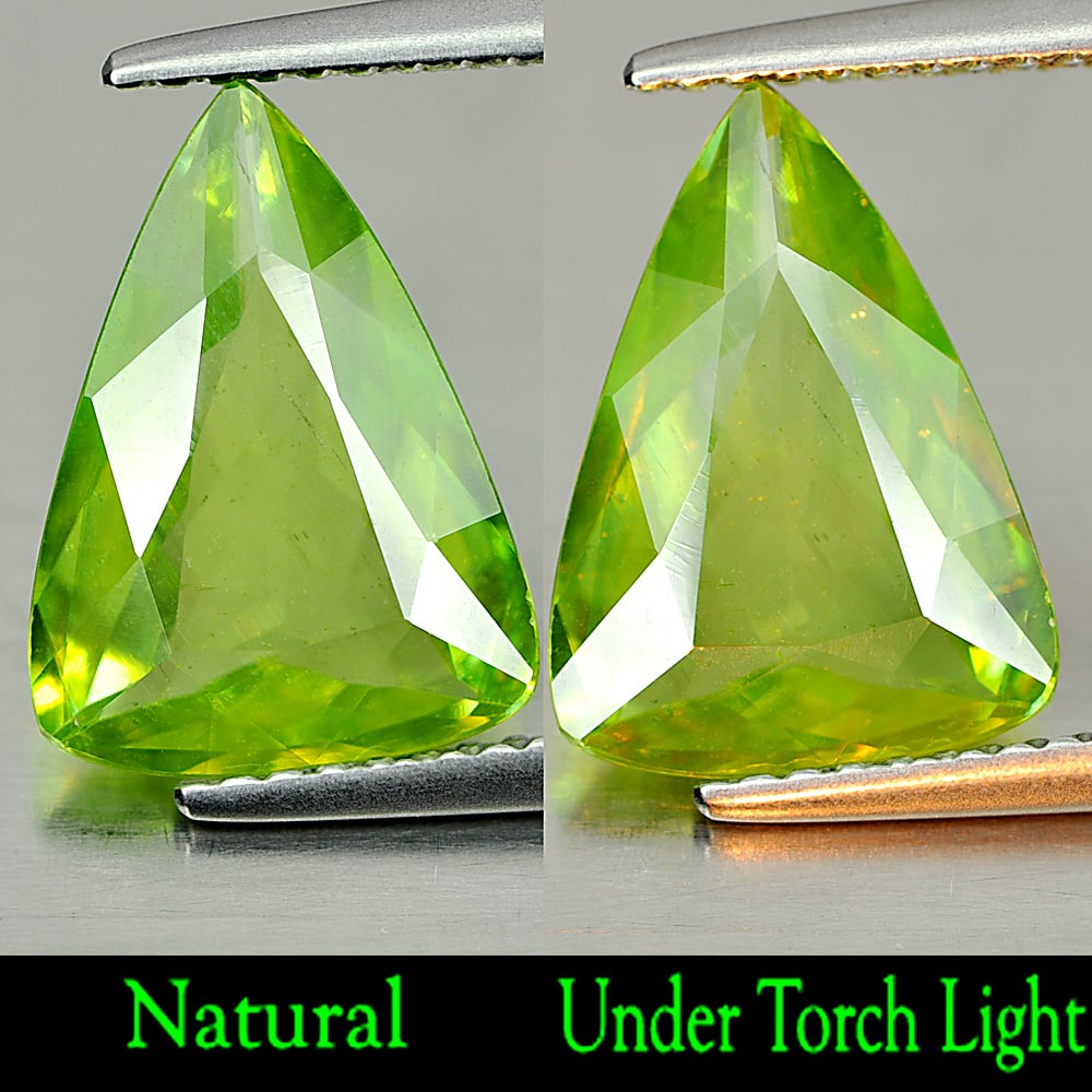 Natural Green Sphene Gemstones 2.52 Ct. Trilliant Shape 12.5 x 9.2 Mm.: Product ID: 806507785 Product Name: Natural Sphene Weight: 2.52 CT. Size: 12.5 x 9.2 x 3.3 MM. Shape: Trilliant Color: Green With Rainbow Spark Clarity:VSI Luster: Adamantine Gems Origin: Madagascar T