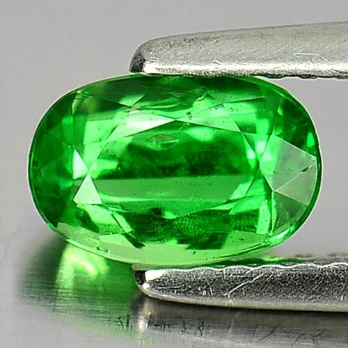 Natural Green Tsavorite Garnet Gemstones 1.01 Ct Oval Shape 7.7 x 5.2 Mm.: Product ID: 803001570 Product Name: Natural Tsavorite Weight: 1.01 CT. Size: 7.7 x 5.2 x 3.8 MM. Shape: Oval Color: Green Clarity:SI1 Luster: Very Good Gems Origin: Tanzania Treatment: Unheated Crysta