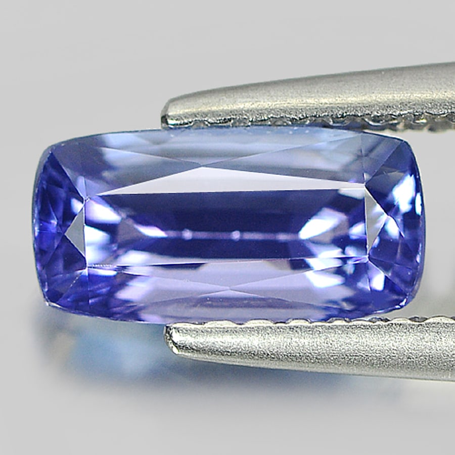 Natural Blue Tanzanite Gemstones 1.23 Ct. Clean Cushion Shape 8.42 x 4.23 Mm.: Product ID: 807005402 Product Name: Natural Tanzanite Weight: 1.23 CT. Size: 8.42 x 4.23 x 4.06 MM. Shape: Cushion Color: Blue Clarity:IF Luster: Very Good Gems Origin: Tanzania Treatment: Heated Crys