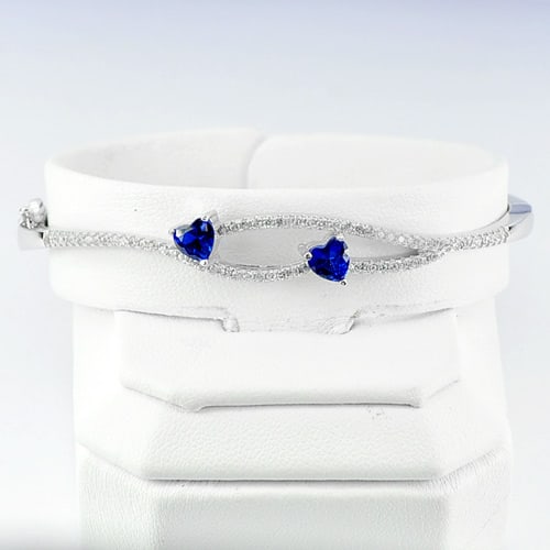 925 Sterling Silver Bangle Jewelry White Gold Plated Diameter 56 Mm.: Product ID: 280550091 Product Type: 925 Sterling Silver Fine Jewelry Jewelry Weight: 8.14 Grams. Gemstones Color: Silver Metal: Solid Silver 92.5%. Gemstone Detail: Heart Blue CZ Size 5 x 5 mm. 2 Pcs.