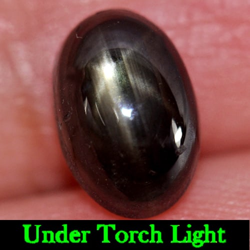 Natural Black Star Sapphire Gemstones 3.99 Ct. Oval Cabochon Shape 9.7 x 6.5 Mm.: Product ID: 806132862 Product Name: Natural Star Sapphire Weight: 3.99 CT. Size: 9.7 x 6.5 x 5.2 MM. Shape: Oval Cabochon Color: Black Clarity:Opaque Luster: Good 6 Rays Star Gems Origin: Thailand Tre
