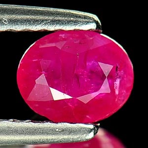 Natural Purplish Pink Ruby Gemstones 0.79 Ct. Oval Shape 6 x 4.9 Mm.: Product ID: 805927043 Product Name: Natural Ruby Weight: 0.79 CT. Size: 6 x 4.9 x 2.9 MM. Shape: Oval Color: Purplish Pink Clarity:VSI Luster: Good Gems Origin: Tanzania Treatment: Heated Lead-glass f