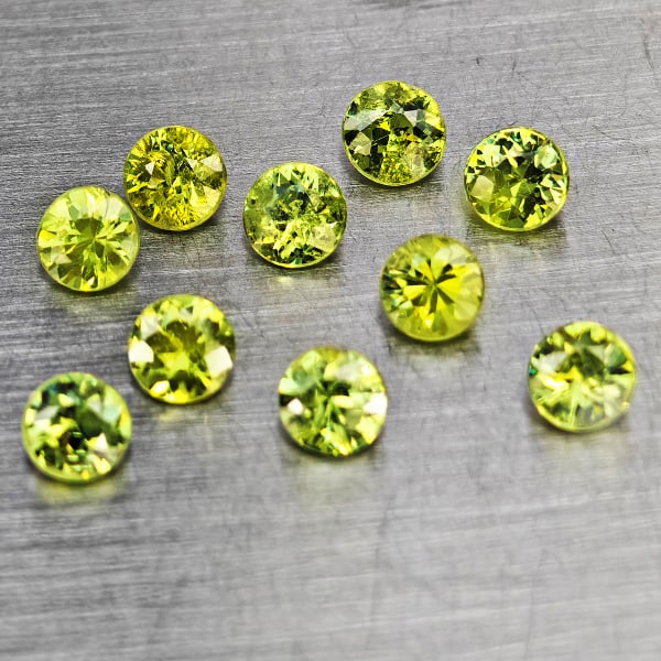Natural Green Demantiod Garnet Gemstones 1.45 Ct. 10 Pcs Round Diamond Cut 3.2 Mm.: Product ID: 802937642 Product Name: Natural Demantoid Weight: 1.45 CT. Size: 3.2 x 3.2 x 2.2 MM. Shape: Round Diamond Cut Color: Green Clarity:SI1 Luster: Good Gems Origin: Madagascar Treatment: Unhea