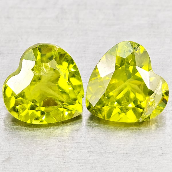 Natural Green Peridot Gemstones 1.79 Ct. 2 Pcs Heart Shape 6.1 x 6.1 Mm.: Product ID: 805317343 Product Name: Natural Peridot Weight: 1.79 CT. Size: 6.1 x 6.1 x 3.9 MM. Shape: Heart Shape Color: Green Clarity:VSI - SI1 Luster: Good Gems Origin: Pakistan Treatment: Unheated 