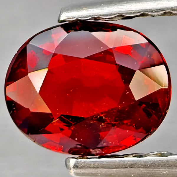 Natural Orangish Red Spessartine Garnet Gemstones 0.79 Ct. Oval Shape 6.1 x 4.9 Mm.: Product ID: 802937314 Product Name: Natural Garnet Weight: 0.79 CT. Size: 6.1 x 4.9 x 2.6 MM. Shape: Oval Shape Color: Orangish Red Clarity:SI1 Luster: Good Gems Origin: Namibia Treatment: Unheated Cr