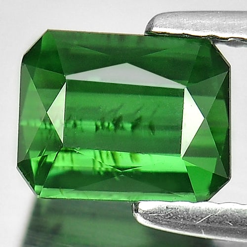 Natural Green Tourmaline Gemstones 1.52 Ct. Octagon Shape 7.4 x 5.8 Mm.: Product ID: 807221532 Product Name: Natural Tourmaline Weight: 1.52 CT. Size: 7.4 x 5.8 x 4 MM. Shape: Octagon Color: Green Clarity:VVS Luster: Good Gems Origin: Nigeria Treatment: Unheated Crystal St