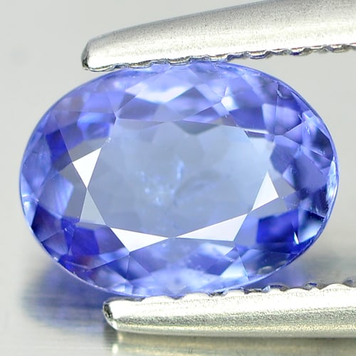 Natural Blue Tanzanite Gemstones 0.74 Ct. Oval Shape 6.9 x 5.1 Mm.: Product ID: 807004255 Product Name: Natural Tanzanite Weight: 0.74 CT. Size: 6.9 x 5.1 x 2.7 MM. Shape: Oval Color: Violetish Blue Clarity:VSI Luster: Very Good Gems Origin: Tanzania Treatment: Heated