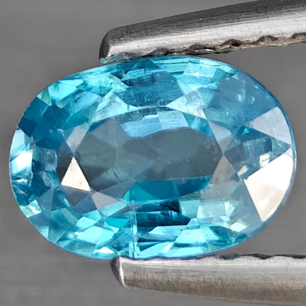 Natural Blue Zircon Gemstones 1.22 Ct. Oval Shape 7 x 5 Mm.: Product ID: 807743211 Product Name: Natural Tanzanite Weight: 1.22 CT. Size: 7 x 5 x 3.1 MM. Shape: Oval Shape Color: Blue Clarity:SI1 Luster: Good Gems Origin: Cambodia Treatment: Heated Crystal Stru