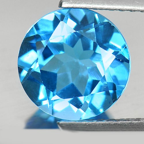 Natural Swiss Blue Topaz Gemstones 3.48 Ct. Round Shape 9.2 Mm.: Product ID: 807157017 Product Name: Natural Blue Topaz Weight: 3.48 CT. Size: 9.2 x 9.2 x 5.6 MM. Shape: Round Color: Swiss Blue Clarity:VSI Luster: Good Gems Origin: Brazil Treatment: Treated Crystal