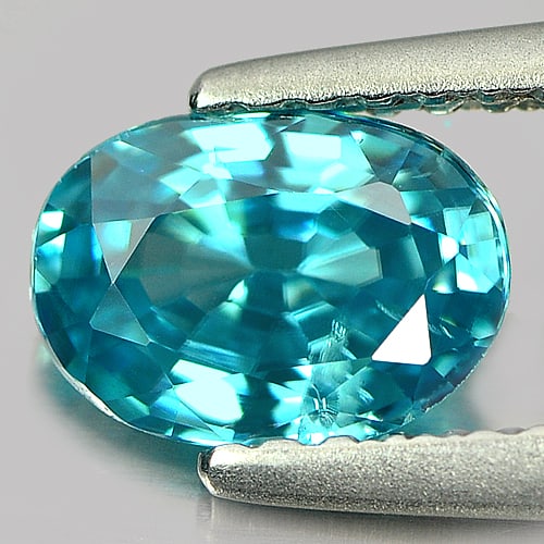 Natural Blue Zircon Gemstones 1.27 Ct. Oval Shape 7.1 x 5.1 Mm.: Product ID: 807721457 Product Name: Natural Zircon Weight: 1.27 CT. Size: 7.1 x 5.1 x 3.2 MM. Shape: Oval Color: Blue Clarity:VSI - SI Luster: Good Gems Origin: Cambodia Treatment: Heated Crystal Stru