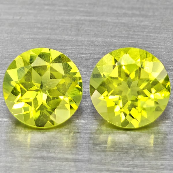 Natural Green Peridot Gemstones 1.31 Ct. 2 Pcs. Round Shape 5.2 Mm.: Product ID: 805317633 Product Name: Natural Peridot Weight: 1.31 CT. Size: 5.2 x 5.2 x 3.1 MM. Shape: Round Color: Green Clarity:VSI Luster: Good Gems Origin: Pakistan Treatment: Unheated Crystal Stru