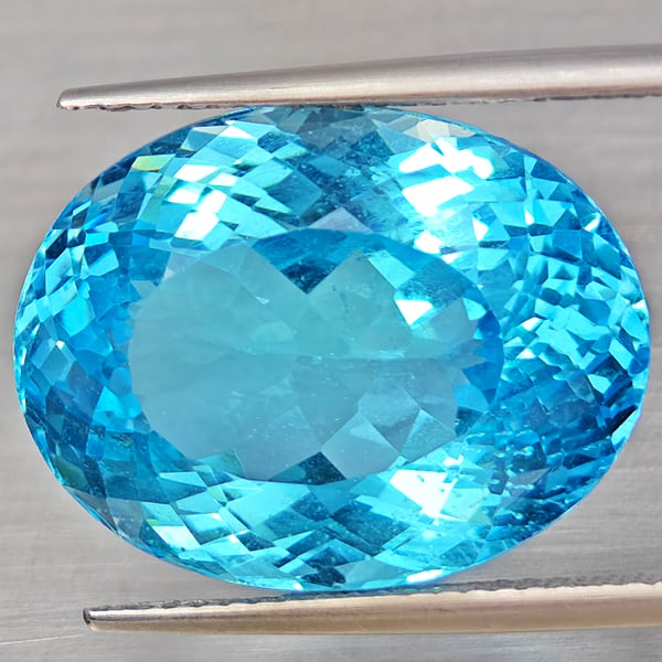 Natural Baby Blue Color Topaz Gemstones 22.71 Ct. Oval Shape 19.2 x 14.6 Mm.: Product ID: 807168509 Product Name: Natural Blue Topaz Weight: 22.71 CT. Size: 19.2 x 14.6 x 10.5 MM. Shape: Oval Shape Color: Baby Blue Color Clarity:VVS - VSI Luster: Very Good Gems Origin: Brazil T