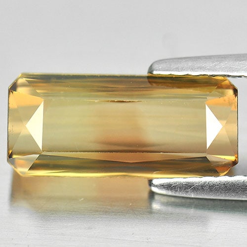 Natural Bi Color Tourmaline Gemstones 3.54 Ct. Octagon Shape 12.9 x 5.8 Mm.: Product ID: 807238036 Product Name: Natural Tourmaline Weight: 3.54 CT. Size: 12.9 x 5.8 x 4.7 MM. Shape: Octagon Color: Bi Color Clarity:VSI Luster: Good Gems Origin: Nigeria Treatment: Unheated Crys