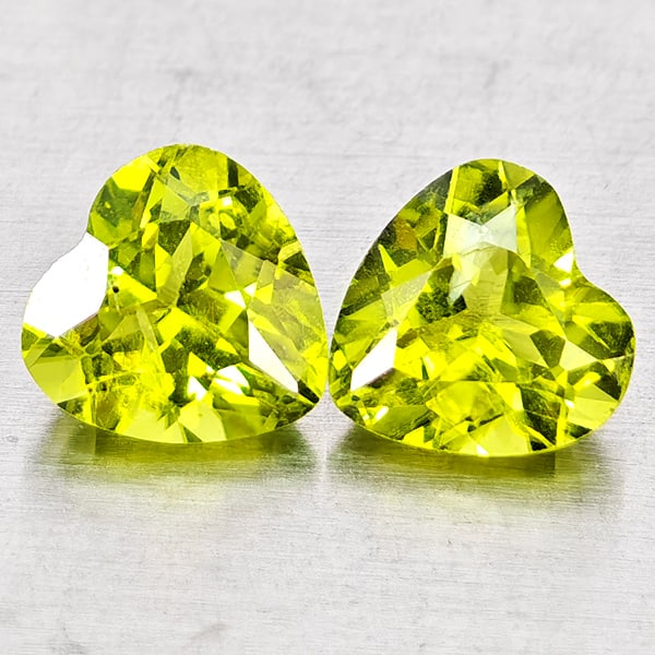 Natural Green Peridot Gemstones 1.75 Ct. 2 Pcs. Heart Shape 6.1 x 6 Mm.: Product ID: 805317330 Product Name: Natural Peridot Weight: 1.75 CT. Size: 6.1 x 6 x 3.7 MM. Shape: Heart Shape Color: Green Clarity:VSI - SI1 Luster: Good Gems Origin: Pakistan Treatment: Unheated Cr
